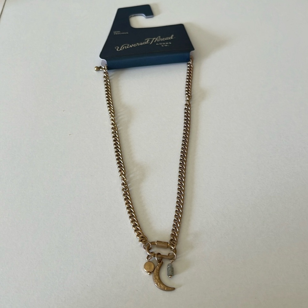 Universal Thread Crescent Necklace